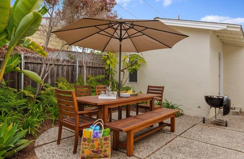 East Beach House | Comfortable Condo Just a Half Block to East Beach!