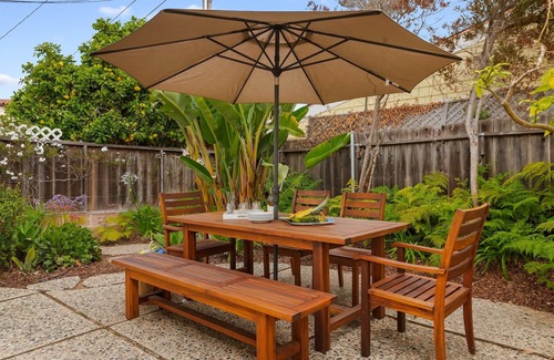East Beach House | Comfortable Condo Just a Half Block to East Beach!