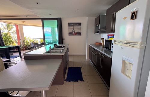 Punaauia Apartment | Condo in Punaauia "Vue Moorea + Piscine" opposite the Anita caravan