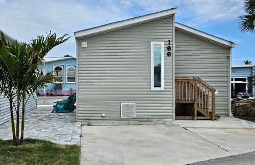 Nettles Island Cottage | Coral Cabana, 166 Nettles - Dockside Beauty!