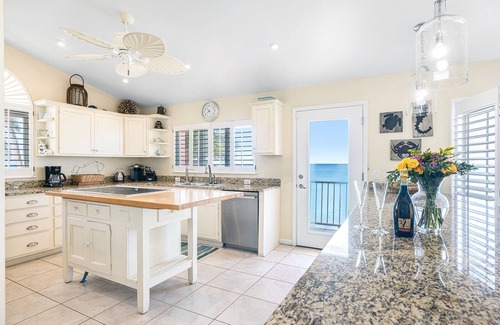 Seven Mile Beach Villa | Coral Reef is directly on Seven Mile Beach - Exclusively by Cayman Villas!