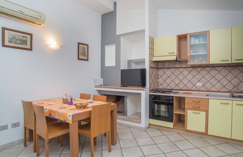 Sant'Elmo House | Cosy apartment in villa for 6 people with A/C, TV, terrace and pets allowed