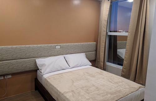 Iligan House | Cozy 1-bedroom hotel in superb Iligan City with AC, WiFi