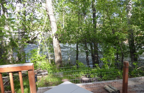 Red Lodge Cabin | Cozy Getaway in Town! Enjoy Rock Creek Flowing Just Steps from Wrap Round Deck