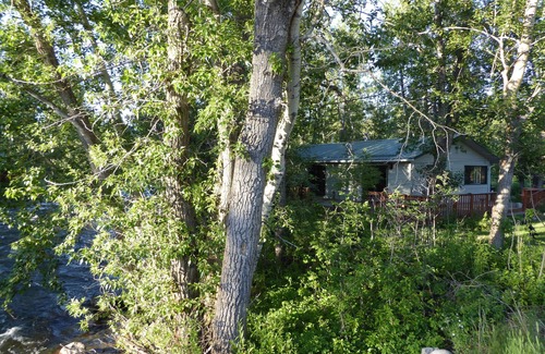 Red Lodge Cabin | Cozy Getaway in Town! Enjoy Rock Creek Flowing Just Steps from Wrap Round Deck