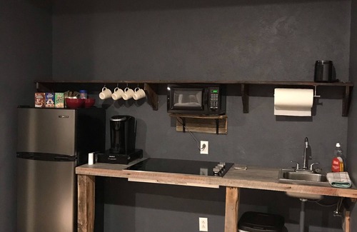 Butte Apartment | Cozy oasis nestled in mature aspen overlooking the city of Butte, Montana