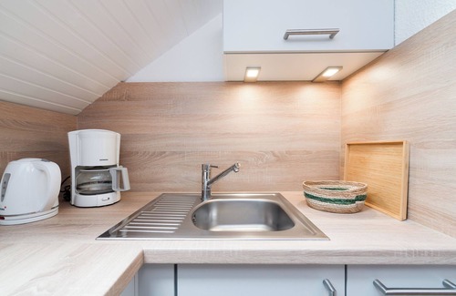 Pelzerhaken Apartment | Cozy top floor apartment with small balcony and sea view in Pelzerhaken