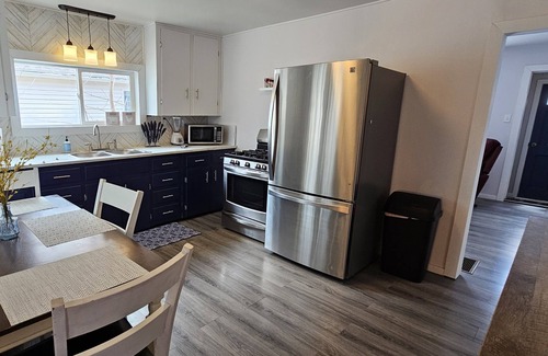 Sault Ste. Marie House | Cozy Up North Retreat in the Heart of Sault Ste. Marie. Pet Friendly! Hot Tub!