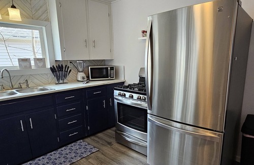 Sault Ste. Marie House | Cozy Up North Retreat in the Heart of Sault Ste. Marie. Pet Friendly! Hot Tub!