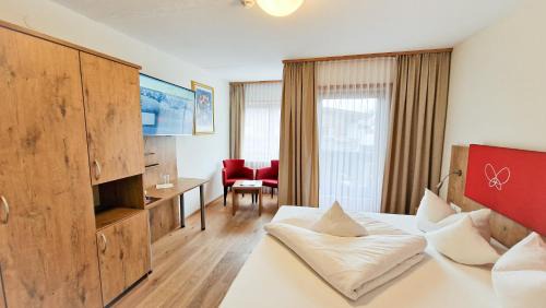 Scheffau am Wilden Kaiser Hotel | Das Alpin - Hotel Garni Guesthouse