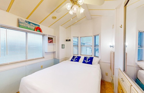 Port Isabel Cottage | Dog-friendly cottage with shaded porch, pools, hot tubs, tennis & bay access