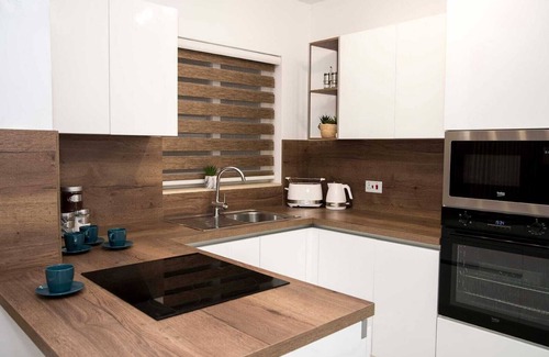 Msida Apartment | East Garden Residences, modern, central condo with 2 large balconies.