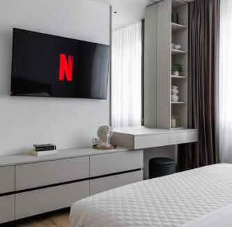 Chisinau Apartment | Elegant Apartment with Balcony, Dedicated Workspace, Coffee Station and 65" Smart TV - GrandStay md