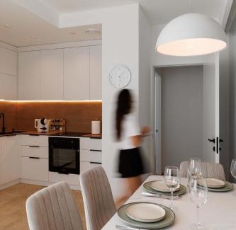Chisinau Apartment | Elegant Apartment with Balcony, Dedicated Workspace, Coffee Station and 65" Smart TV - GrandStay md