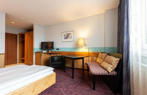Korntal-Munchigan Hotel | enjoyHotel garni Korntal Stuttgart b&b Parkplatz Sprinter Penny eTank