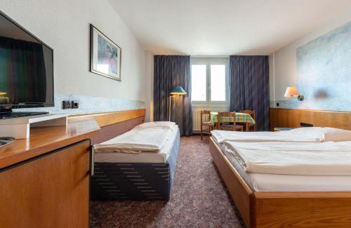 Korntal-Munchigan Hotel | enjoyHotel garni Korntal Stuttgart b&b Parkplatz Sprinter Penny eTank