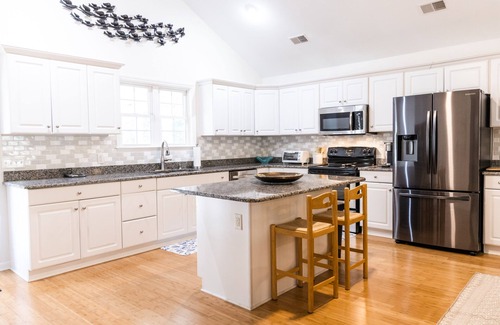 Ocean Ridge House | Exceptional 4 bedroom coastal cottage with pool access, walk to the beach!