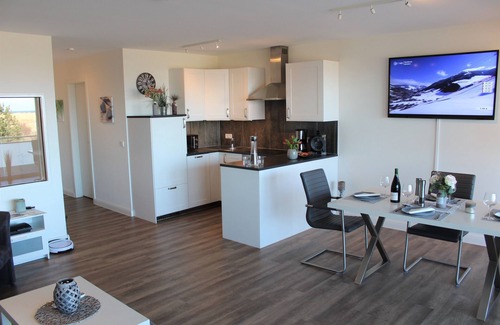 Heiligenhafen Apartment | Exclusive apartment "Meerdüne" in direct beach location with balcony and sea view