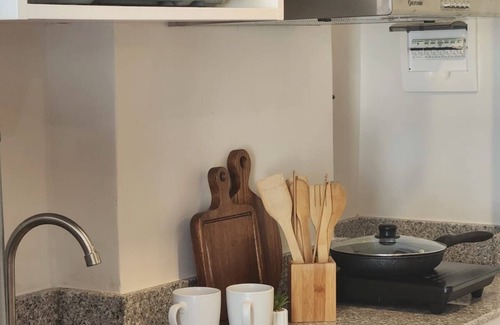 Mactan Export Processing Zone Condo | Experience affordable luxury in our cozy & homey staycation layover pad.