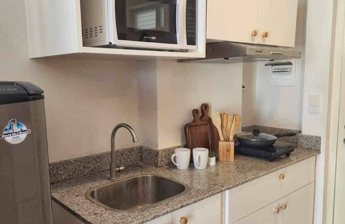 Mactan Export Processing Zone Condo | Experience affordable luxury in our cozy & homey staycation layover pad.