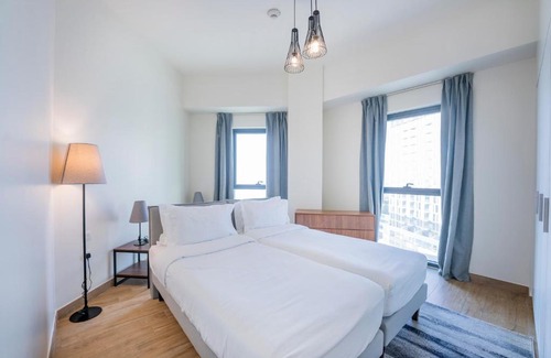 Dubai House | Expo Village Serviced Apartments