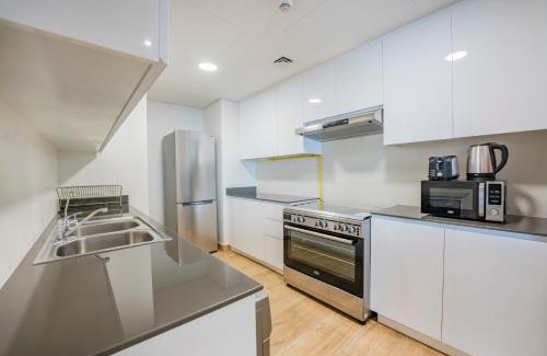 Dubai House | Expo Village Serviced Apartments