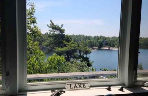 The Archipelago Cottage | Feathery Pines cottage with sauna and sunset views