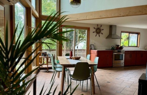 Tofino House | First Light - Vintage waterfront with hot tub, sauna + EV charger
