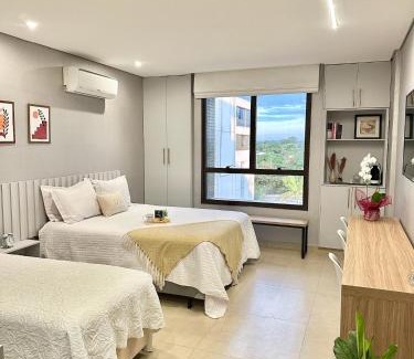 Lago Norte Apartment | Flat aconchegante - Perto de Tudo - Vista Livre - Estacionamento privativo e Portaria 24h - Wi-Fi 600mbps