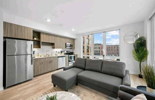 Riverside Apartment | Free Secured Parking! Walk 2 Riverfront & Conv Center + EV Charger