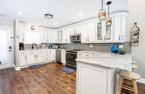 Lake Delton Condo | FULLY UPGRADED LAKEFRONT PENTHOUSE PANORAMIC VIEWS WITH BEACH ACCESS BOAT SLIP
