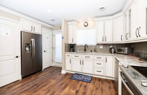 Lake Delton Condo | FULLY UPGRADED LAKEFRONT PENTHOUSE PANORAMIC VIEWS WITH BEACH ACCESS BOAT SLIP