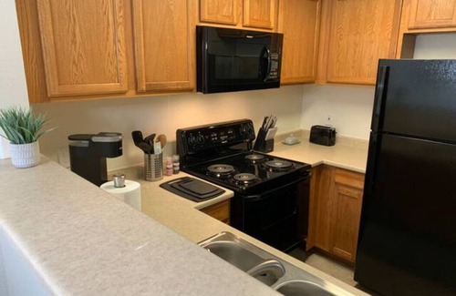 Downtown Condo | Gated, Private, Safe, Clean Upstairs Condo-Hospitals Nearby