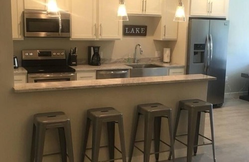 Arnolds Park Condo | Getaway Ready Okoboji Condo steps away from Arnolds Park and Lake Okoboji!