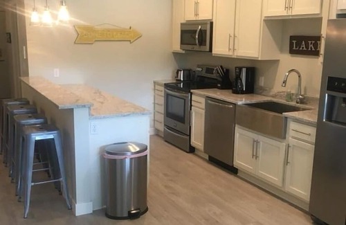 Arnolds Park Condo | Getaway Ready Okoboji Condo steps away from Arnolds Park and Lake Okoboji!
