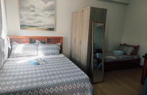 Trece Martires Apartment | Happy Stays D - 300mbps - 65"TV NetFlix, Disney - Washer