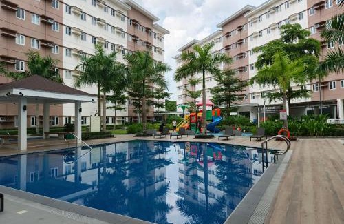 Trece Martires Apartment | Happy Stays D - 300mbps - 65"TV NetFlix, Disney - Washer