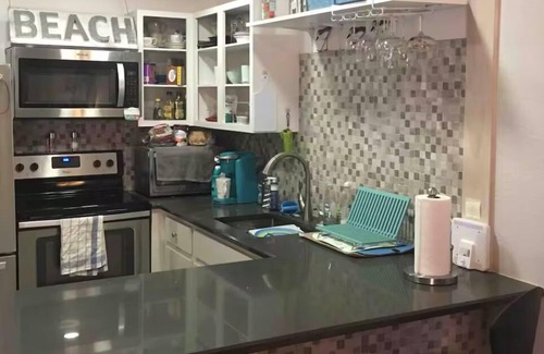 Sand Key Apartment | Healthcare Traveling Rental Paradise on the BEACH gated condo