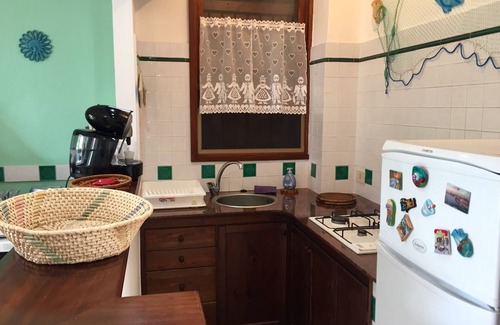 Santa Margherita di Pula House | Holiday house in Sardinia at La Perla Marina sandy beach front