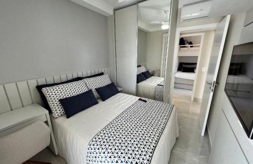 Vila Clais House | Home 48 I Apto pé na areia e com Piscina Aquecida em Bertioga