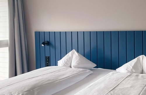 Unterseen Hotel | HOP Apartments & Suites