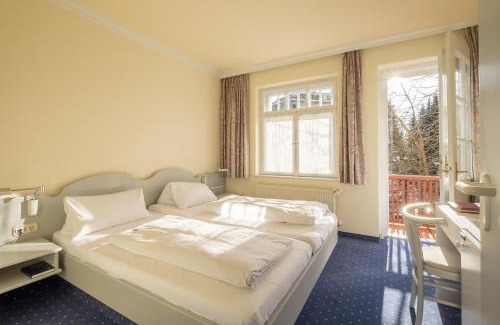 Gauting Hotel | Hotel Gautinger Hof - Ruhig im Fünf-Seen-Land nahe S-Bahn und München