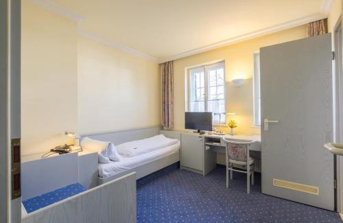 Gauting Hotel | Hotel Gautinger Hof - Ruhig im Fünf-Seen-Land nahe S-Bahn und München
