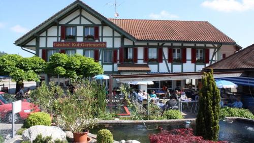 Hausernmoos Hotel | Hotel Restaurant Koi-Gartenteich