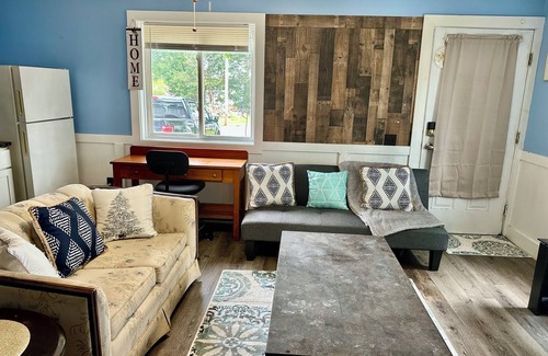 Biddeford Apartment | House dwelling that combines The bedroom kitchen and living area into one space