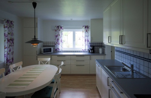 Axland House | Idyllic sunny lakeside location with only 20 m to the private jetty and boat.