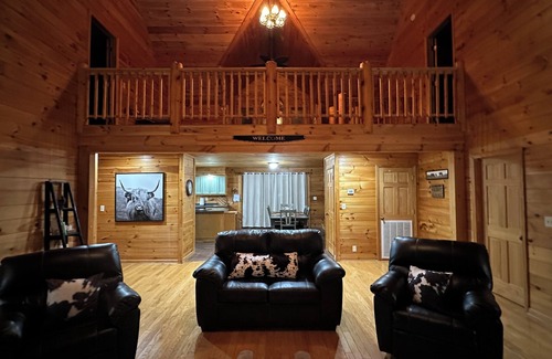 Toombs County Cabin | Kennedy Family Cabin- a large log cabin in a rural, farming community