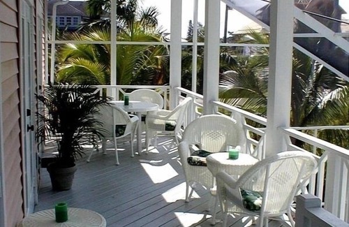 Sanibel House | Key West Style Home. With Screened Heated Pool. Only a 6 Minute Walk To Beach.