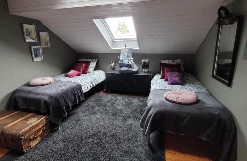 Dison Bed & Breakfast | L'Atelier Bed and Breakfast