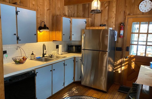 Pocono Pines Cabin | LAKE FRONT! Newly updated Cabin with a private beach. Great Location!